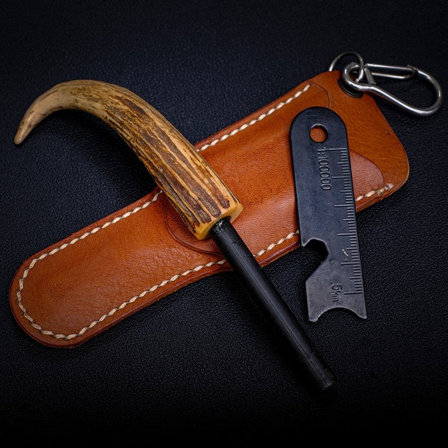 How to Import Ferrocerium Rods from China to Australia: A Handy Guide for Business Owners to Find Ferro Rod Suppliers 1 A ferro rod for sale with a brown-blue wooden handle and a leather sheath.