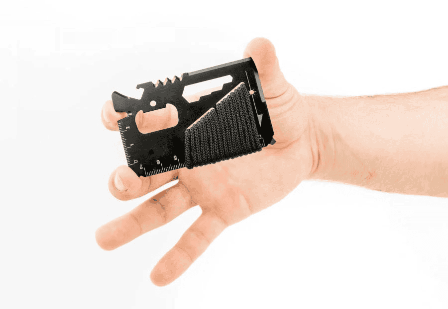 Top 10 Survival Card Suppliers in Canada: Bulk Options for Outdoor Enthusiasts and Emergency Responders 16 Man holding survival card bulk.