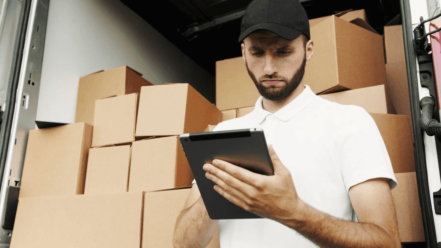Paracord manufacturer: Man in White Polo Shirt Using a Tablet Computer