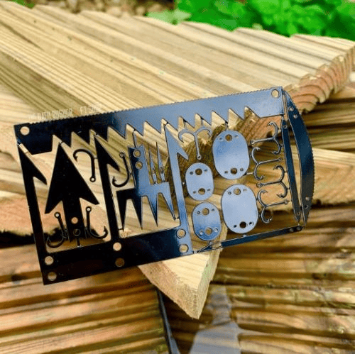 Top 10 Survival Card Suppliers in the UK: A Guide to Outdoor Survival Cards and Where to Buy Them in Bulk 12 Survival card suppliers: Black Wilderness Wallet Survival Card supported by scrap cut wood.