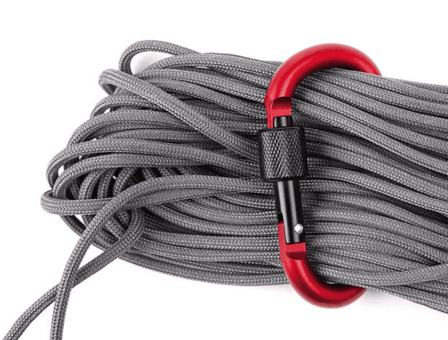Paracord wholesale: a coil of gray rope inserted into a red carabiner