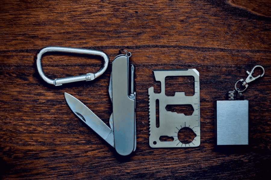 Top 10 Survival Card Suppliers in the UK: A Guide to Outdoor Survival Cards and Where to Buy Them in Bulk 1 Survival card wholesale: Survival pocket tools on a wooden surface.