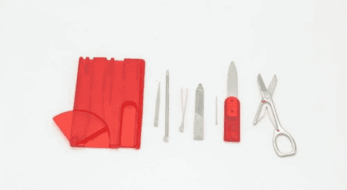 Importing Survival Card Bulk from China to the US: Tips, Considerations, and Potential Suppliers 11 Survival card manufacturers: contents of Smile Tools' red survival card are laid on a white surface.