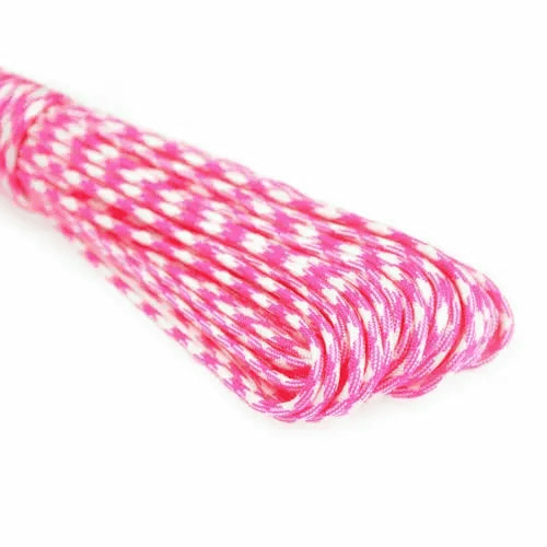 Paracord wholesale: pink paracord with white reflective line on white surface.