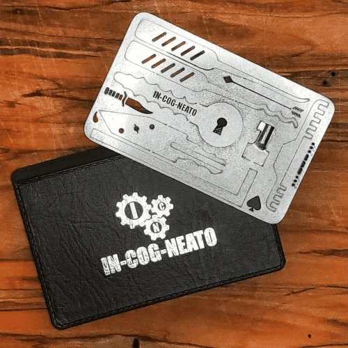 Survival card manufacturers: survival card for lock picking and black leather case on a wooden surface.