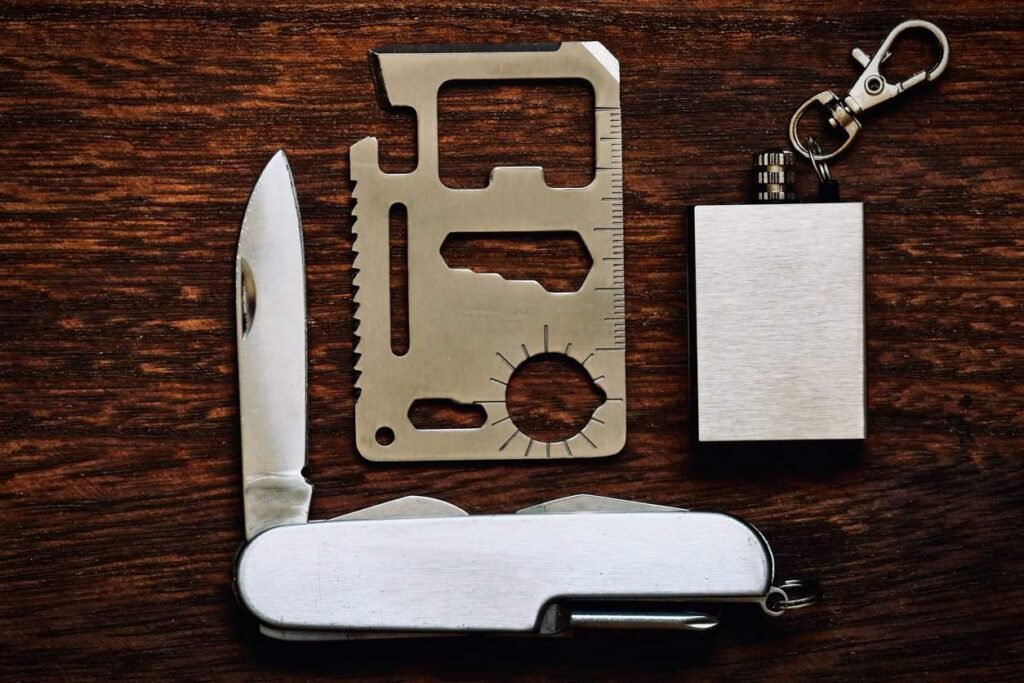 Survival card bulk: pocket tools on a wooden surface.