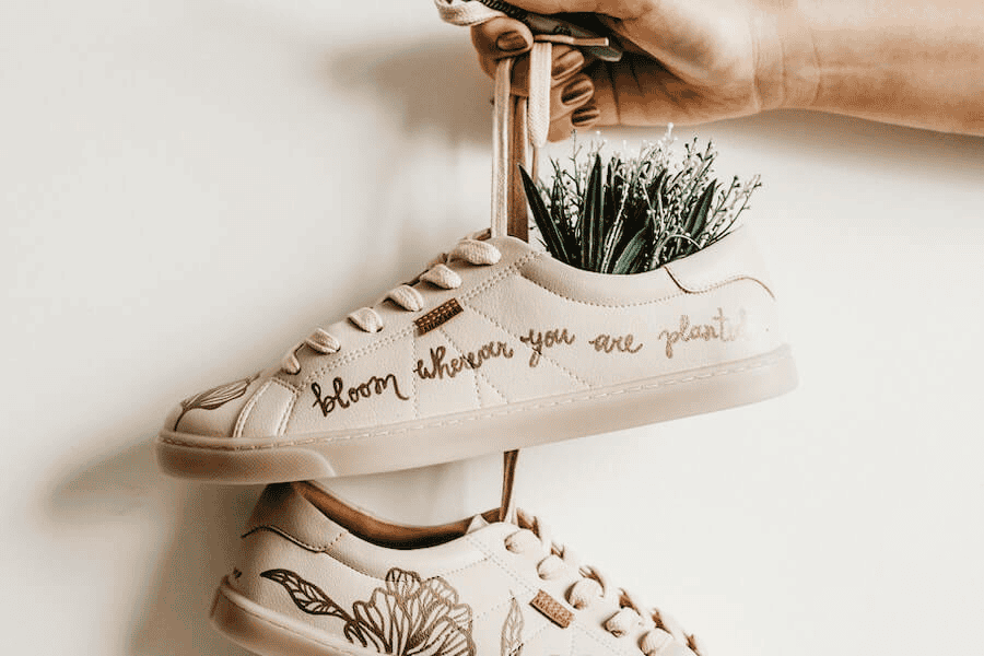 Can You Make Money Selling Paracord from a Reputable Paracord Manufacturer? 5 Paracord manufacturing: person holding white sneakers.