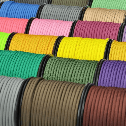 Paracord wholesale: rows of colorful paracord wrapped in spools.