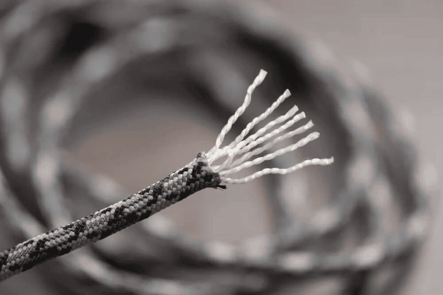 Paracord factory: A close-up image of paracord with exposed core strands.