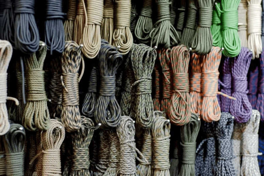 Paracord factory: Rows of colorful paracord for sale.