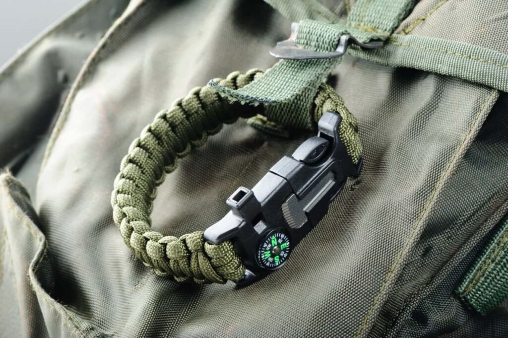 Paracord manufacturing: A close-up image of a green tactical paracord bracelet.