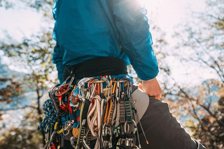 Paracord factory: A climber carrying paracord, carabiners, and other climbing accessories.