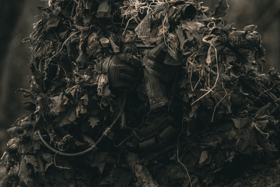 Paracord manufacturing: A sniper wearing a ghillie suit.
